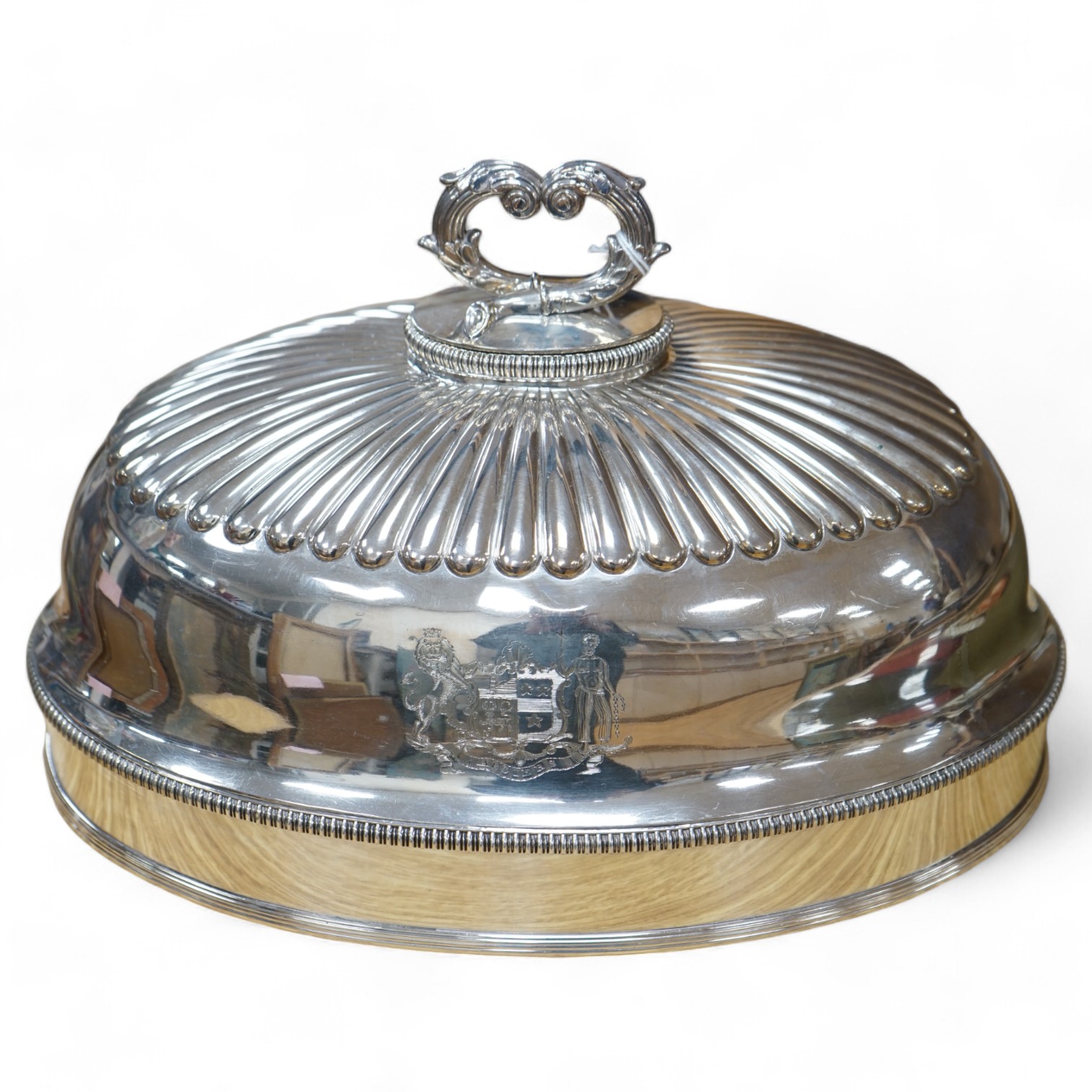 A 19th century Old Sheffield plate oval meat dish cover, with handle, 32.5cm long. Condition - good